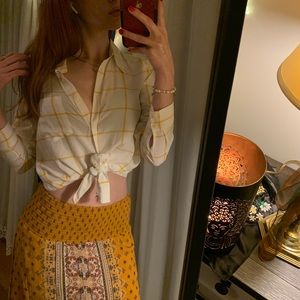 Long sleeve yellow patterned dress shirt.